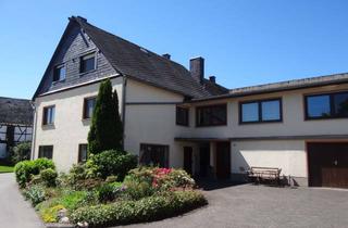 Haus kaufen in 56290 Dommershausen, Doppeltes Wohnglück auf großem Grundstück mit vielseitigen Nebengebäuden