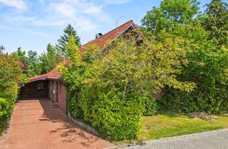 Einfamilienhaus kaufen in 26524 Lütetsburg, Einfamilienhaus mit Holzcharakter in ruhiger Sackgassenlage nahe Golfplatz