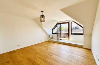 Wohnung kaufen in 88142 Wasserburg, Spannende Dachgeschosswohnung in Seenähe
