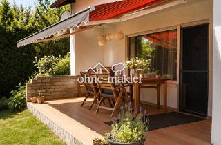 Einfamilienhaus kaufen in 83301 Traunreut, Freistehendes Haus mit Traumgarten, Balkon, Terrasse und Garage In Traunreut