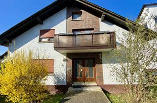 Haus kaufen in Heckholzhäuser Straße 38, 65620 Waldbrunn, Ruhiges Wohnidyll am Bachlauf: geräumiges Zweifamilienhaus mit großen Eckgrundstück