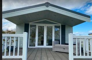 Haus kaufen in 23779 Neukirchen, Neukirchen - Traum-Mobilheim in exklusiver Teichlage am Ostseestrand
