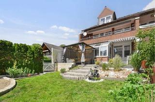 Wohnung kaufen in 24628 Hartenholm, 3‑Zimmer‑Wohnung mit Gartenanteil, großer Fensterfront & überdachter Terrasse