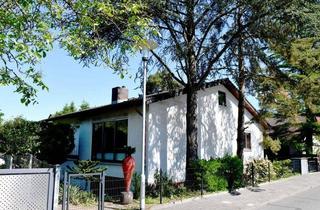 Einfamilienhaus kaufen in 64297 Darmstadt, Viel Platz für das Leben – freistehendes Einfamilienhaus mit Einliegerwohnung in Waldrandnähe von Darmstadt-Eberstadt