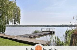 Haus kaufen in Zossener Straße 34, 15838 Am Mellensee, Wassergrundstück, Haus mit 4 Wohnungen, Scheune, Bungalow direkt am See und zusätzliches Bauland