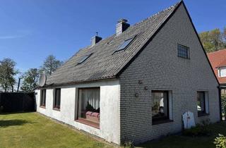 Haus kaufen in 27639 Nordholz, Siedlungshaus mit Anbau, 2 Garagen und 1 Carport