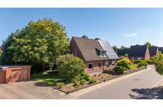 Doppelhaushälfte kaufen in 25746 Heide, Solide Doppelhaushälfte mit pflegeleichtem Grundstück und Modernisierungspotenzial in Heide