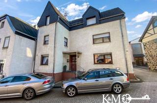 Haus kaufen in 56220 Bassenheim, Gepflegtes Wohnhaus mit großzügiger Raumaufteilung, Terrasse und Garage in Bassenheim
