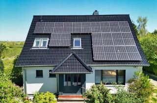 Einfamilienhaus kaufen in 24392 Süderbrarup, Modernisiertes Einfamilienhaus mit Wintergarten, Kaminofen, PV und viel Platz in ruhiger Lage. Top!