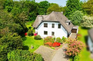 Einfamilienhaus kaufen in 53797 Lohmar, Mehr als ein Zuhause Einfamilienhaus mit Einliegerwohnung und großem Garten in Lohmar.