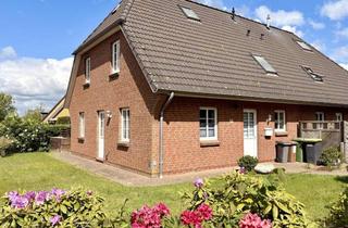 Doppelhaushälfte kaufen in 25821 Bredstedt, Attraktive Doppelhaushälfte mit zwei geräumigen Garagen in schöner Lage
