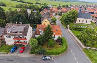 Einfamilienhaus kaufen in 35510 Butzbach, Butzbach - RUHE PUR IN BESTER FELDRANDLAGE! - Familienidyll mit Wintergarten, Weitblick und Natur in Fauerbach