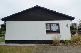 Haus kaufen in 27449 Kutenholz, Kutenholz - Winkelbungalow in ruhiger Ortslage zu verkaufen