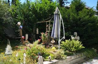 Wohnung kaufen in 80807 München, München - Exklusive Gartenwohnung in Schwabing - 300 m² Privatgarten