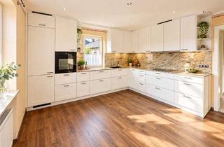 Wohnung kaufen in 83404 Ainring, Kernsaniert wohnen mit eigenem Gartenanteil