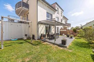 Wohnung kaufen in 85399 Hallbergmoos, Moderne 3-Zimmer-Wohnung mit großem Garten und zusätzlichem Raum im Souterrain