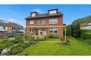 Wohnung kaufen in 46562 Voerde, Komfortable Erdgeschosswohnung mit Terrasse, Kamin und großem Gemeinschaftsgrundstück in Spellen!