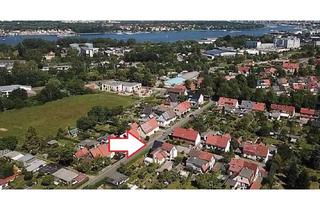 Doppelhaushälfte kaufen in 18069 Reutershagen, Doppelhaushälfte in Top-Lage mit Garage und Süd-West Garten