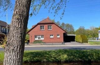 Einfamilienhaus kaufen in 26871 Papenburg, Exklusive Kanallage in Papenburg – Großzügiges Familienhaus mit besonderem Potenzial