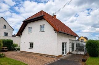 Einfamilienhaus kaufen in Von-Reifenberg Straße 7a, 56235 Ransbach-Baumbach, Zuhause mit Potenzial: Einfamilienhaus in ruhiger zweiter Baureihe