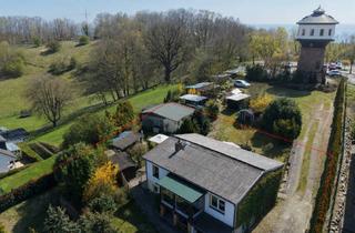 Haus kaufen in 18586 Göhren, Wohnhaus mit zwei Einheiten, Ferienbungalow und großem Grundstück in strandnaher Lage