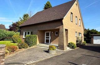 Einfamilienhaus kaufen in 41379 Brüggen, Charmantes Einfamilienhaus mit großem Grundstück und Entwicklungspotential