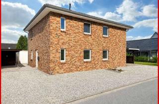 Haus kaufen in 24855 Jübek, Stilvoll und modern Wohnen - sehr gepflegtes Zweifamilienhaus in bester Wohnlage