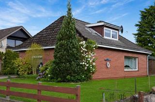 Haus kaufen in 21781 Cadenberge, Charmanter Bungalow mit ausgebautem Dachgeschoss und schönem Garten in ruhiger Lage