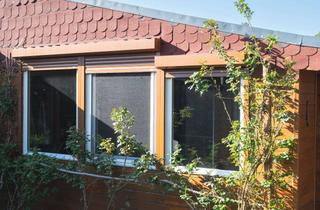 Haus kaufen in Kastanienallee 729, 38524 Sassenburg, Holzhaus am Bernsteinsee | 100 m² Wohnfläche, Wintergarten & 2 Carports