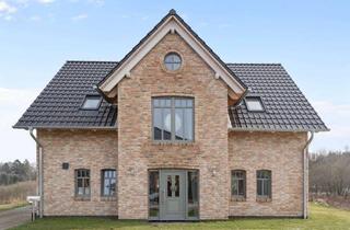 Einfamilienhaus kaufen in 25794 Pahlen, Hochwertiges Einfamilienhaus am Wasser – Architektur im Einklang mit der Natur