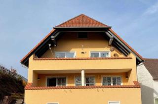 Haus kaufen in 91480 Markt Taschendorf, Gepflegtes Zweifamilienhaus mit sechs Stellplätzen in Markt Taschendorf