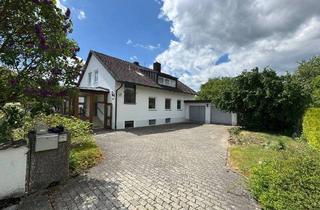 Haus kaufen in 85253 Großberghofen, Großberghofen - Ein Zuhause mit Freiraum: Zweifamilienhaus auf traumhaft großem Gartengrundstück!