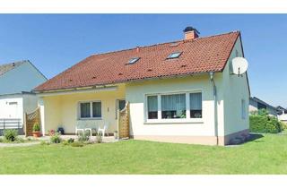 Haus kaufen in 32791 Lage, Lage - Sehr gepflegter Bungalow mit Vollkeller, Garage und Doppelcarport in ruhiger Wohnlage von Lage-Kachtenhausen