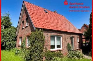 Einfamilienhaus kaufen in 26624 Südbrookmerland, Einfamilienhaus mit Potenzial und großem Grundstück im Zentrum von Moordorf!