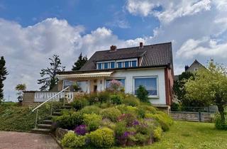 Einfamilienhaus kaufen in 31171 Nordstemmen, Charmantes Einfamilienhaus mit Wintergarten und Garage auf großem Grundstück
