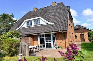 Haus kaufen in 25826 Sankt Peter-Ording, Exklusive DHH mit Keller, Garage & traumhaften Garten