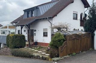 Haus kaufen in 65558 Gückingen, Luxus-Haus mit Pool-Landschaft, Kamin, Wintergarten, Doppelgarage, 205qm Wfl. und SonderFinanzierung