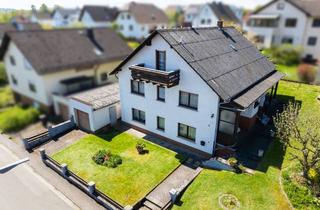 Einfamilienhaus kaufen in 35641 Schöffengrund, Ein Zuhause voller Möglichkeiten mit sonnigem Garten in Niederwetz
