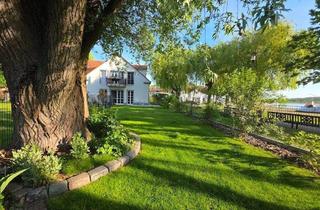 Wohnung kaufen in 16818 Wustrau, Wustrau - Stylische Terrassenwohnung mit Garten direkt am Yachthafen