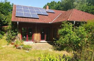 Haus kaufen in 25557 Hanerau-Hademarschen, Hanerau-Hademarschen - Natur und Ruhe in ebenerdigem Winkelbungalow gr Garten PV-Anlage
