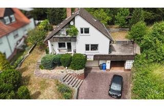 Einfamilienhaus kaufen in 63773 Goldbach, Goldbach - Einfamilienhaus mit Einliegerwohnung und zwei Garagen auf großzügigem Grundstück in Goldbach