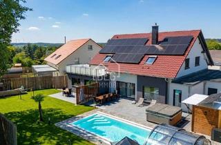 Einfamilienhaus kaufen in 74592 Kirchberg, Exklusives Einfamilienhaus mit Einliegerwohnung, nachhaltigem Energiekonzept & privater Wellnessoase