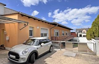 Einfamilienhaus kaufen in 56299 Ochtendung, Ruhig wohnen in zweiter Reihe: Vielseitiges Einfamilienhaus mit XXL-Balkon und riesigem Potenzial