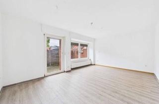 Wohnung kaufen in 48429 Rheine, Gartenwohnung: 3-Zimmer-Erdgeschosswohnung mit sonniger Terrasse und Garten