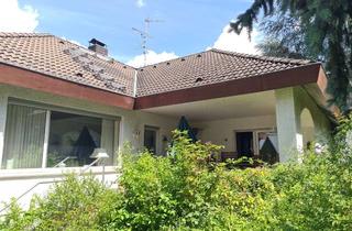 Haus kaufen in 64331 Weiterstadt, Weiterstadt, eleganter Winkelbungalow mit reizvollem Gartengrundstück