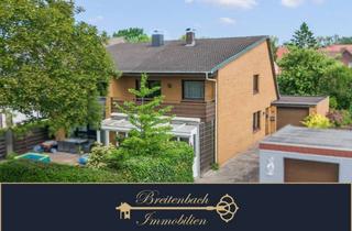 Doppelhaushälfte kaufen in 26954 Nordenham, Wohnen mit Wohlfühlfaktor – Doppelhaushälfte mit Kamin und Wintergarten