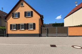 Haus kaufen in 76187 Knielingen, Mehr Raum für Ihre Lebenspläne – attraktives Zwei-in-Eins-Immobilienangebot