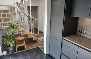 Wohnung kaufen in 88471 Laupheim, Laupheim - Helle Maisonette-Wohnung mit zwei Dachterrassen und TG-Stellplatz