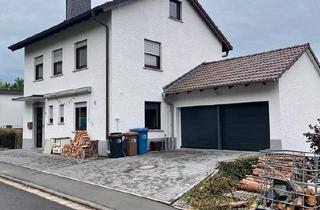 Einfamilienhaus kaufen in 35796 Weinbach, Weinbach - Charmantes Einfamilienhaus mit Doppelgarage