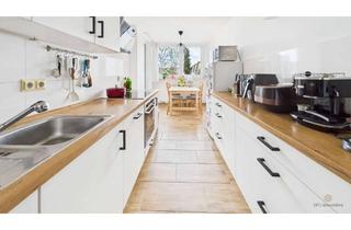 Wohnung kaufen in 85716 Unterschleißheim, Gepflegte 3-Zimmer-Wohnung mit Balkon, moderner Einbauküche, Tiefgaragenstellplatz und Wellnessberei